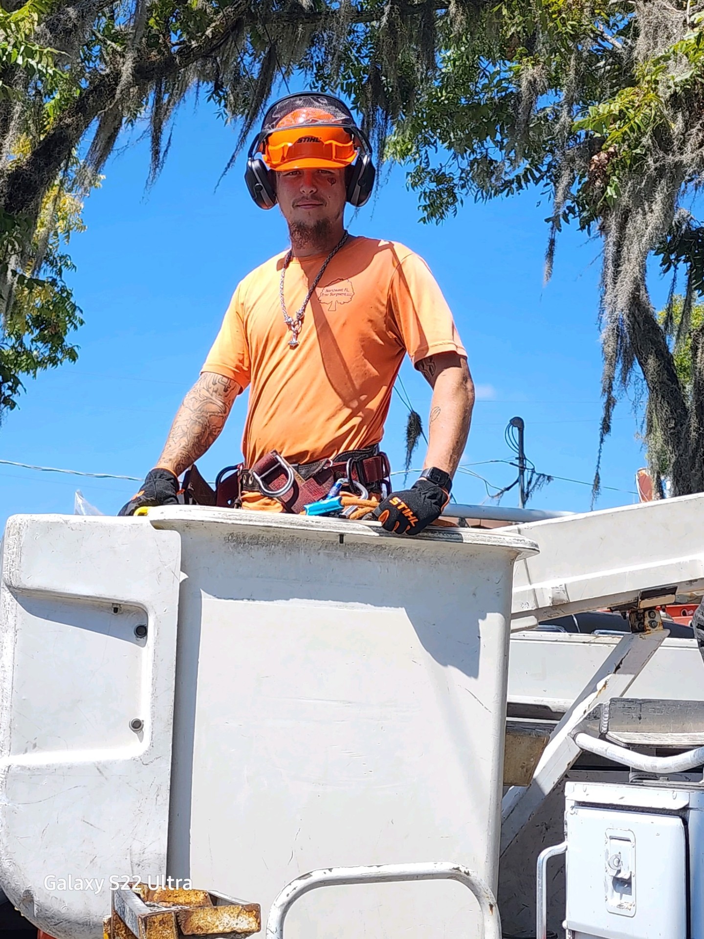 Certified crew member geared up in the bucket